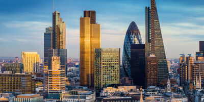Skyscrapers of the world famous bank district of central London at sunset - England, UK